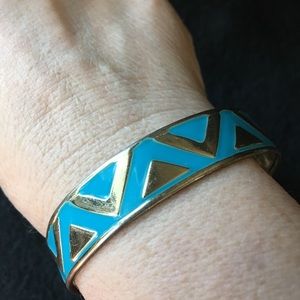 Gold and turquoise colored bracelet